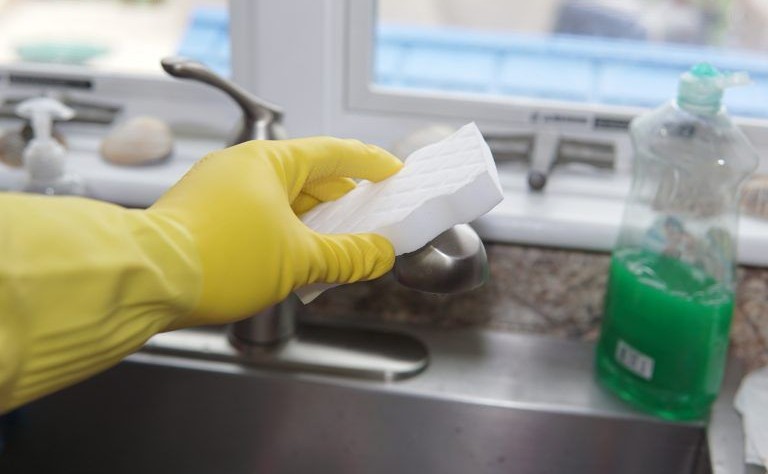 Cropped picture of a person using magic eraser