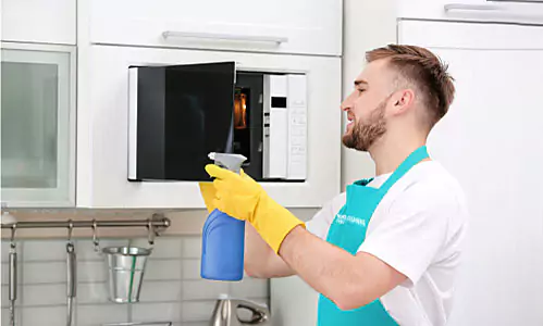 https://www.bondcleaning.sydney/wp-content/uploads/2025/09/man-cleaning-the-oven-1.webp